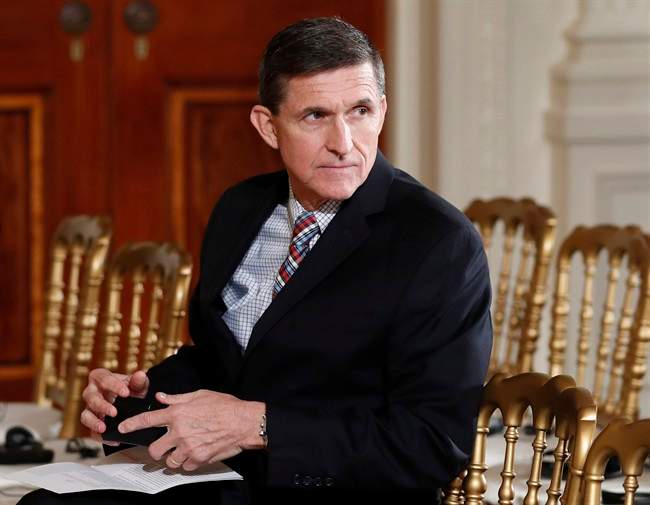 In this Feb. 10, 2017 file photo, then-National Security Adviser Michael Flynn sits in the East Room of the White House in Washington.
