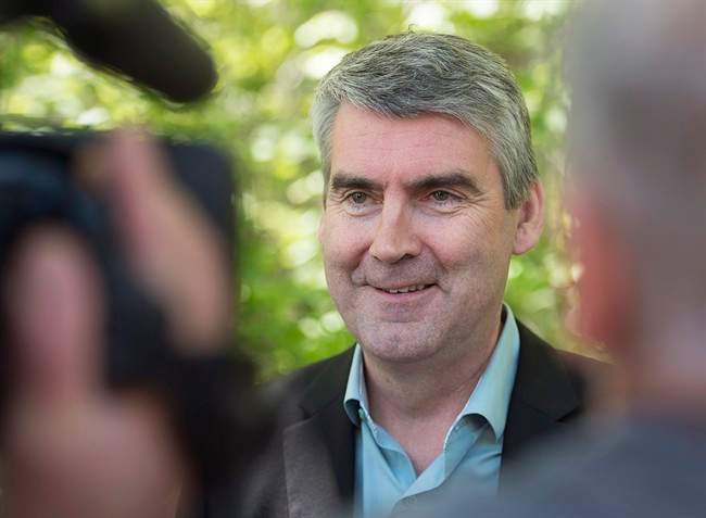 File - Nova Scotia Premier Stephen McNeil talks with reporters after vote in the provincial election at the community centre in Granville Centre, N.S. on Tuesday, May 30, 2017.
