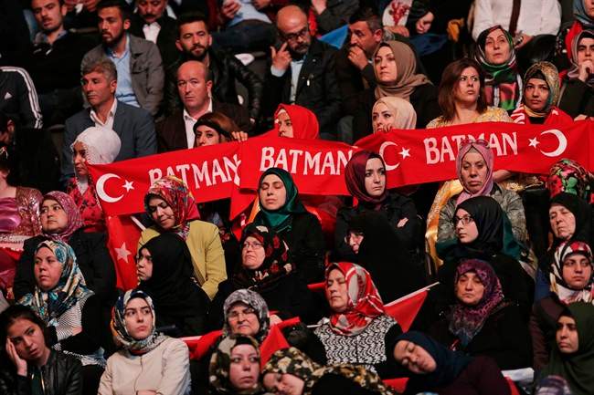 Turkey's ruling party elects President Erdogan as leader.