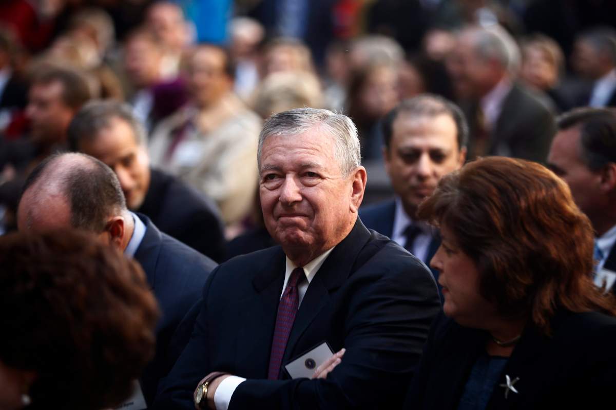 Former Attorney General John Ashcroft is seated before President Barack Obama and James Comey arrive for Comey's installation ceremony as FBI director, Monday, Oct. 28, 2013, at FBI Headquarters in Washington. 