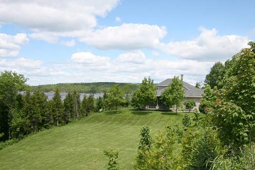 This home boasts 450 feet of private waterfront on the Kennebecasis River