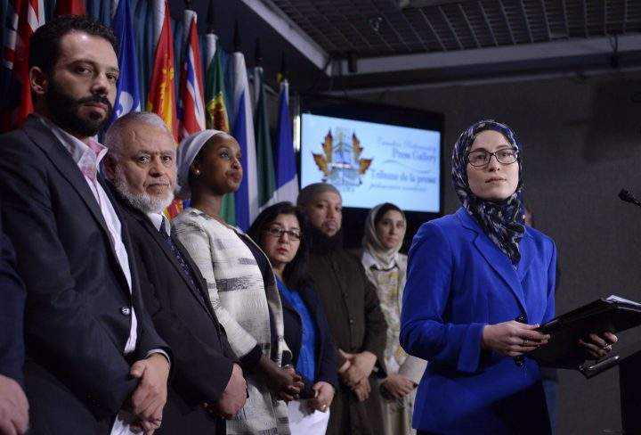 National Council of Canadian Muslims communications director Amira Elghawaby listens to a reporter’s question at a press conference in February.