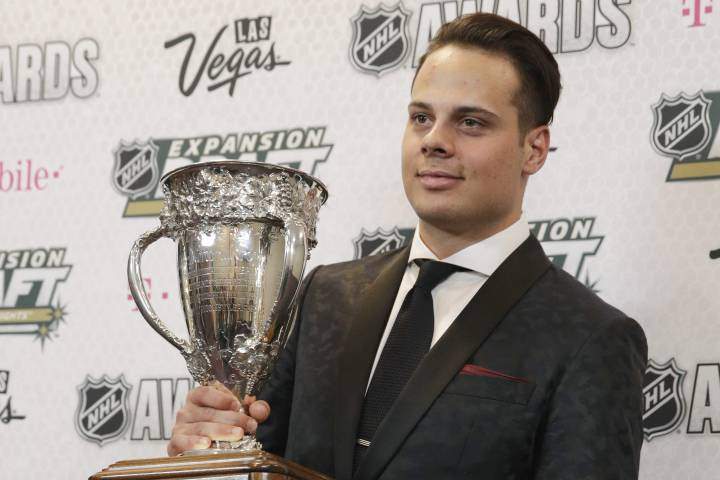 Auston Matthews of the Toronto Maple Leafs holds the Calder Memorial Trophy after winning the award during the NHL Awards, Wednesday, June 21, 2017, in Las Vegas.