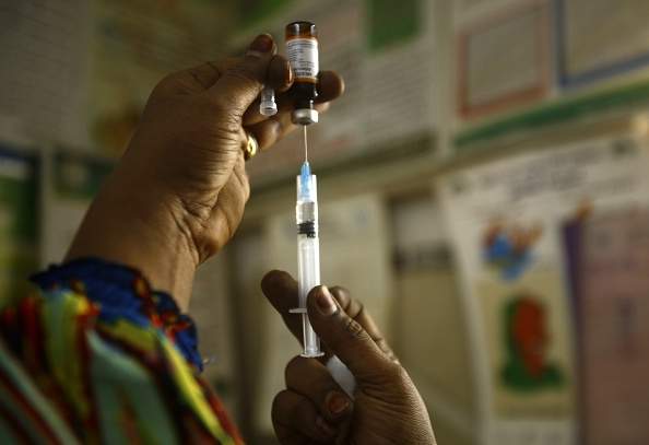 A Sudanese nurse prepares an inoculation against measles at the Samir Medical Clinic in the Sahafa neighbourhood of the Sudanese capital, Khartoum, on June 22, 2015. 