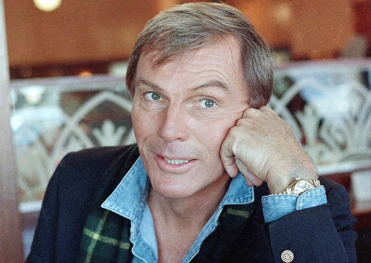 In this Dec. 11, 1985 file photo, Adam West poses for a photo in Los Angeles. On Saturday, June 10, 2017, his family said the actor, who portrayed Batman in a 1960s TV series, has died at age 88. 