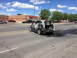 There was quite a commotion on Quance St. Wednesday after a car caught fire near the GoodLife Fitness.