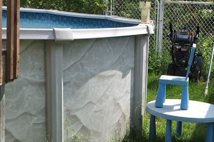 A Laval father posted on social media after his daughter stacked a table and chair to get into the pool, Thursday, June 1, 2017.