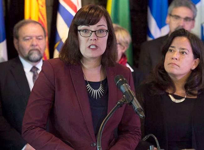 Alberta Justice Minister Kathleen Ganley fields a question at a news conference of a meeting of federal, provincial and territorial justice and public safety ministers in Halifax on Friday, Oct. 14, 2016.