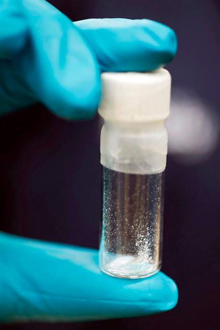 In this Aug. 9, 2016, file photo, a vial containing 2mg of fentanyl, which will kill a human if ingested into the body, is displayed at the Drug Enforcement Administration (DEA) Special Testing and Research Laboratory in Sterling, Va. New national figures released by public health officials show an estimated 2,458 people died in Canada from opioid-related overdoses in 2016.
