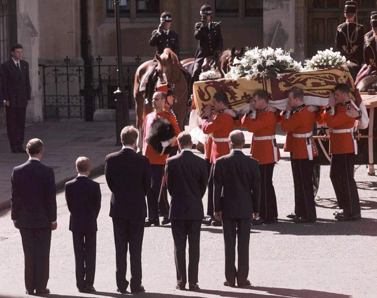 Prince Charles, Prince Harry, Earl Charles Spencer, Prince William and Prince Philip stand as the coffin bearing the body of Princess Diana is taken into Westminster Abbey, Saturday, Sept. 6, 1997 in London. (AP Photo/John Gaps III)