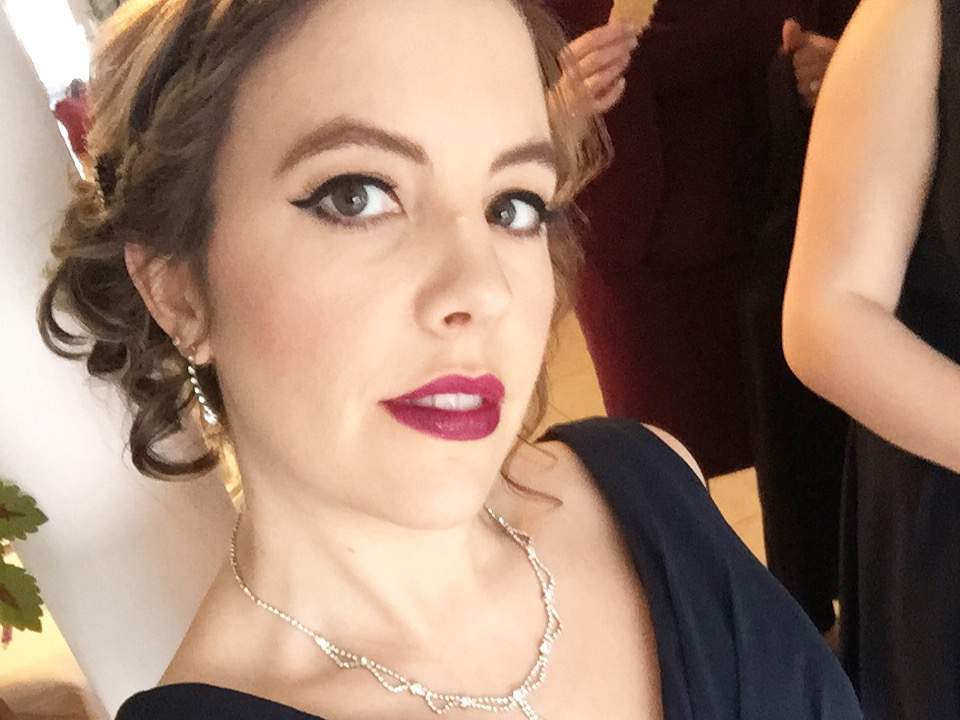 Her hair and makeup for the day of the event cost $250.