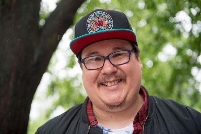 Indigenous poet Jordan Abel is shown during an interview with The Canadian Press in Toronto on Thursday, May 25, 2017. One of the most lucrative prizes in poetry will be handed out at a gala event in Toronto tonight. A long poem about racism and the representation of indigenous peoples from Nisga'a writer Abel is among the three Canadian titles shortlisted for the award. THE CANADIAN PRESS/Frank Gunn.