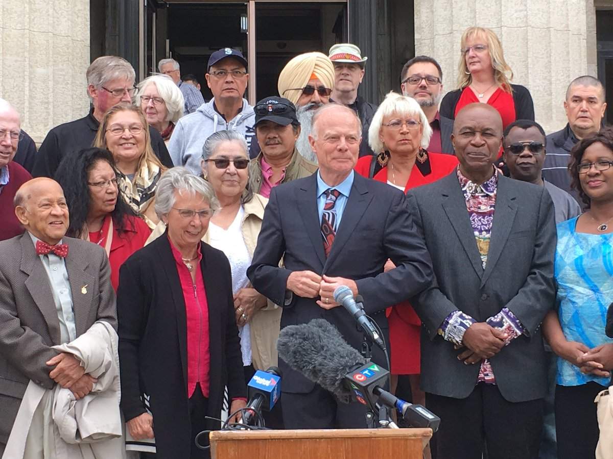 Jon Gerrard at an event Friday on the steps of the Manitoba legislature. 