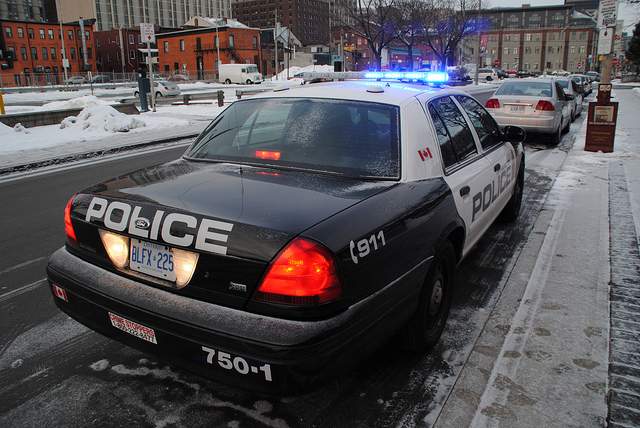 Hamilton Police arrested four teenagers and seized a firearm and drugs after a disturbance downtown.