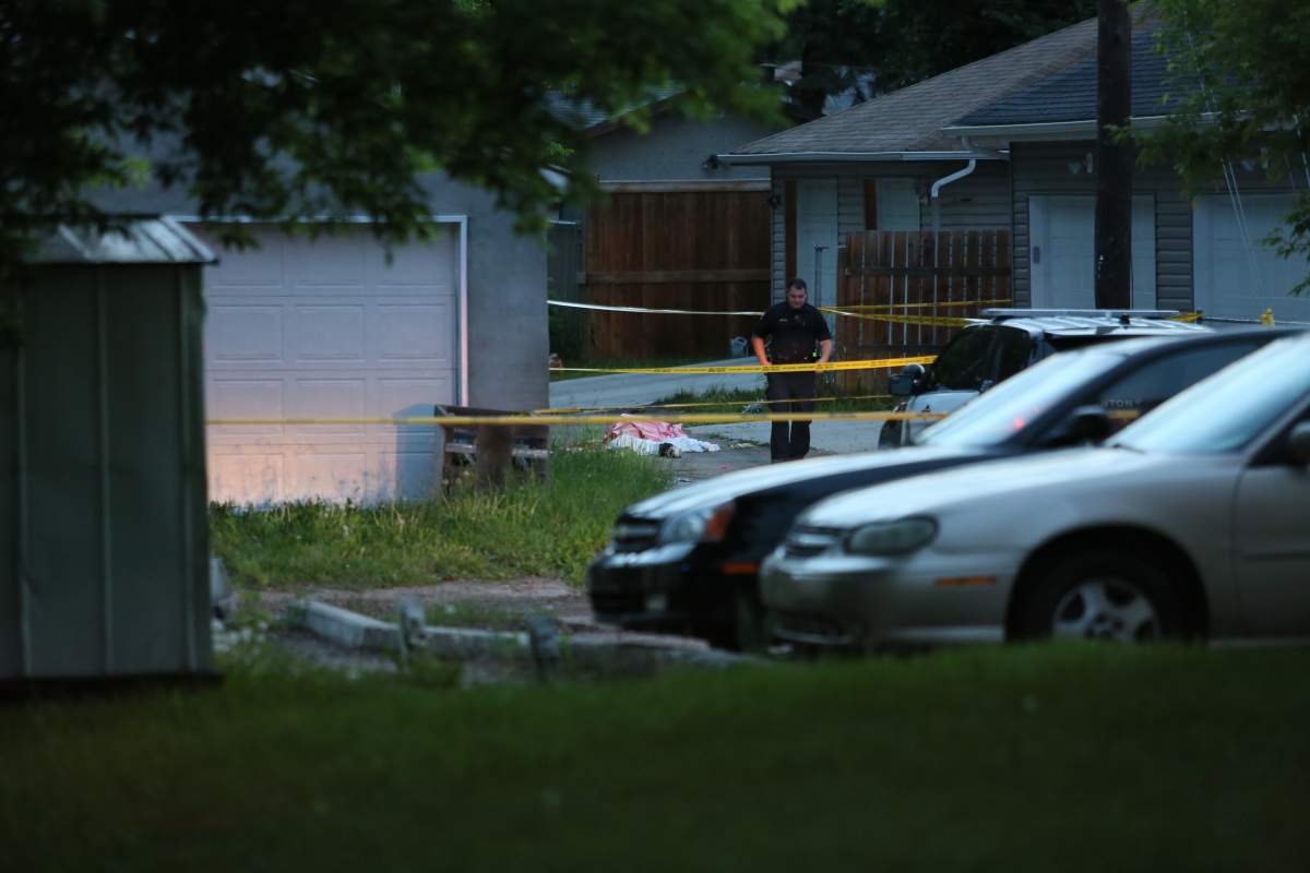 Edmonton Police Service investigating in an alley north of 118 Avenue, between 49 and 50 Street. June 16, 2017.