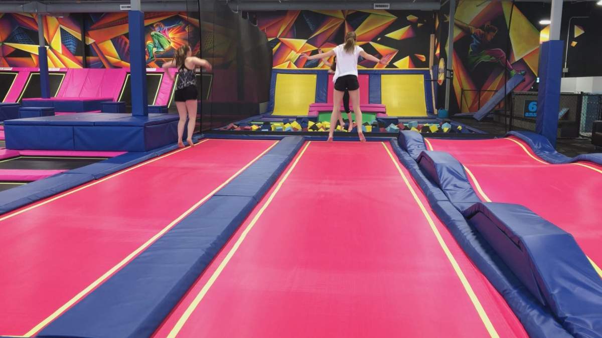 People jumping on trampolines at iSaute in Kirkland on Wednesday, June 14, 2017.
