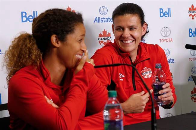Team Canada soccer players Desiree Scott and Christine Sinclair joke around during a press conference in Winnipeg, Tuesday, June 6, 2017 prior to their match against Costa Rica on Thursday. 