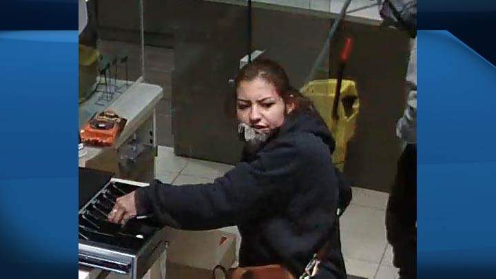 Two women armed with a handgun and bear spray make off with cash, cigarettes in a Saskatoon armed robbery.