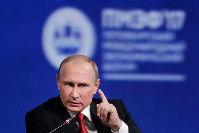 In this June 2, 2017 file photo, Russian President Vladimir Putin gestures as he speaks at the St. Petersburg International Economic Forum in St. Petersburg, Russia.