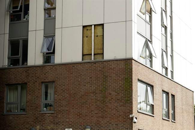 A view of part of the Burnham residential tower on the Chalcots Estate showing the bottom section of the building after cladding was removed, in the borough of Camden, north London, Thursday, June 22, 2017.