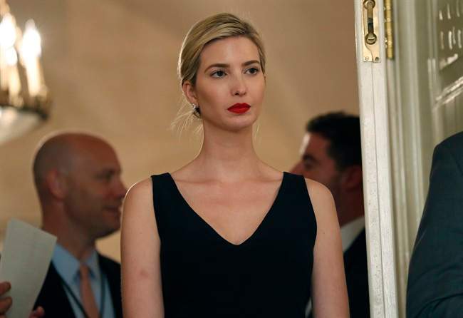 In this Friday, June 2, 2017 file photo, Ivanka Trump, the daughter and assistant to U.S President Donald Trump, stands in the doorway as President Donald Trump speaks before signing bills in the Diplomatic Reception Room at the White House, in Washington. 