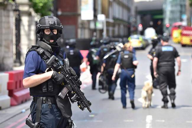 Armed police on St Thomas Street, London, Sunday June 4, 2017, .