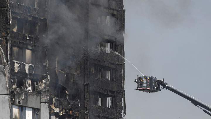 Firefighters battle a blaze at an apartment tower in London.