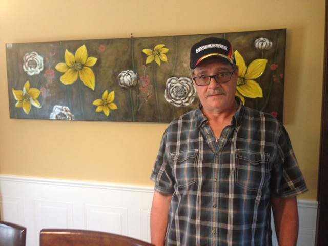 Michael Richard, who almost returned to Alberta after continuing to be denied a New Brunswick driver's licence, finally received the piece of ID on Friday.