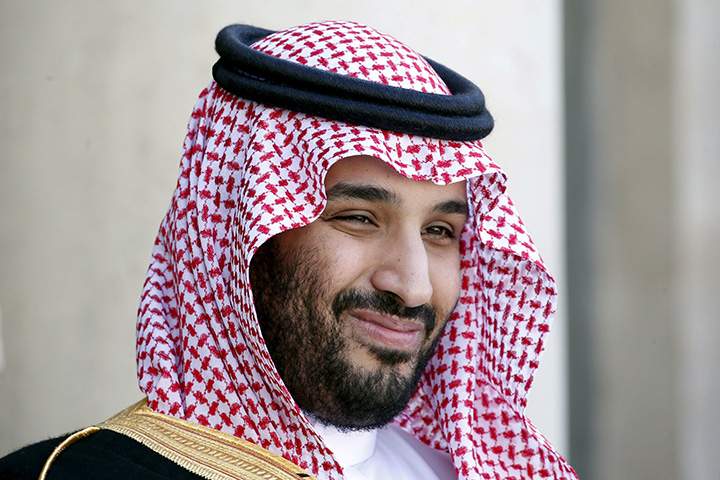 Saudi Arabia’s Crown Prince Mohammed bin Salman reacts upon his arrival at the Elysee Palace in Paris, France, June 24, 2015.