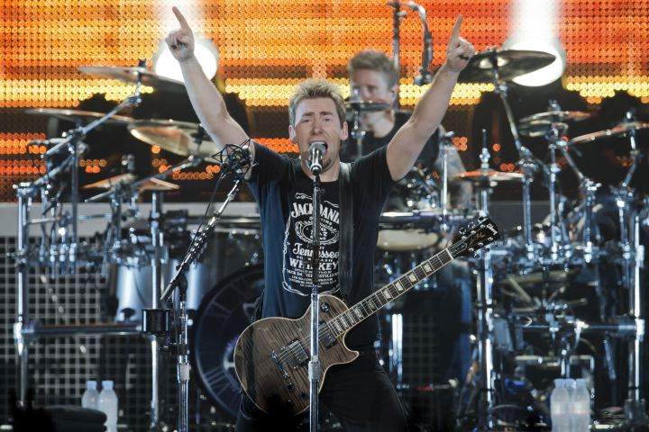 Nickelback's Chad Kroeger on stage.