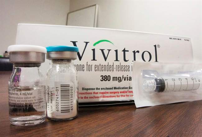 FILE - This Oct. 19, 2016, file photo shows the packaging of Vivitrol at an addiction treatment center in Joliet, Ill.