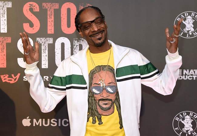FILE - In this Wednesday, June 21, 2017, file photo, Snoop Dogg arrives at the Los Angeles premiere of "Can't Stop, Won't Stop: A Bad Boy Story" at the Writers Guild Theater on in Beverly Hills, Calif.