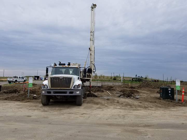 Auger truck hits natural gas line in Brighton neighbourhood forcing the evacuation of four homes.