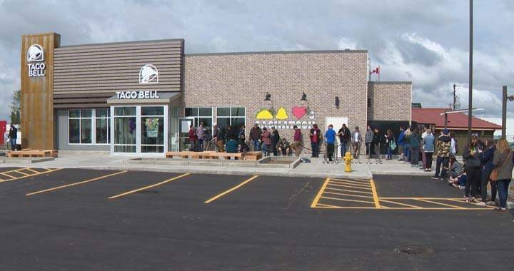 Saskatoon police were present for crowd and traffic control as Taco Bell welcomed patrons on Thursday.
