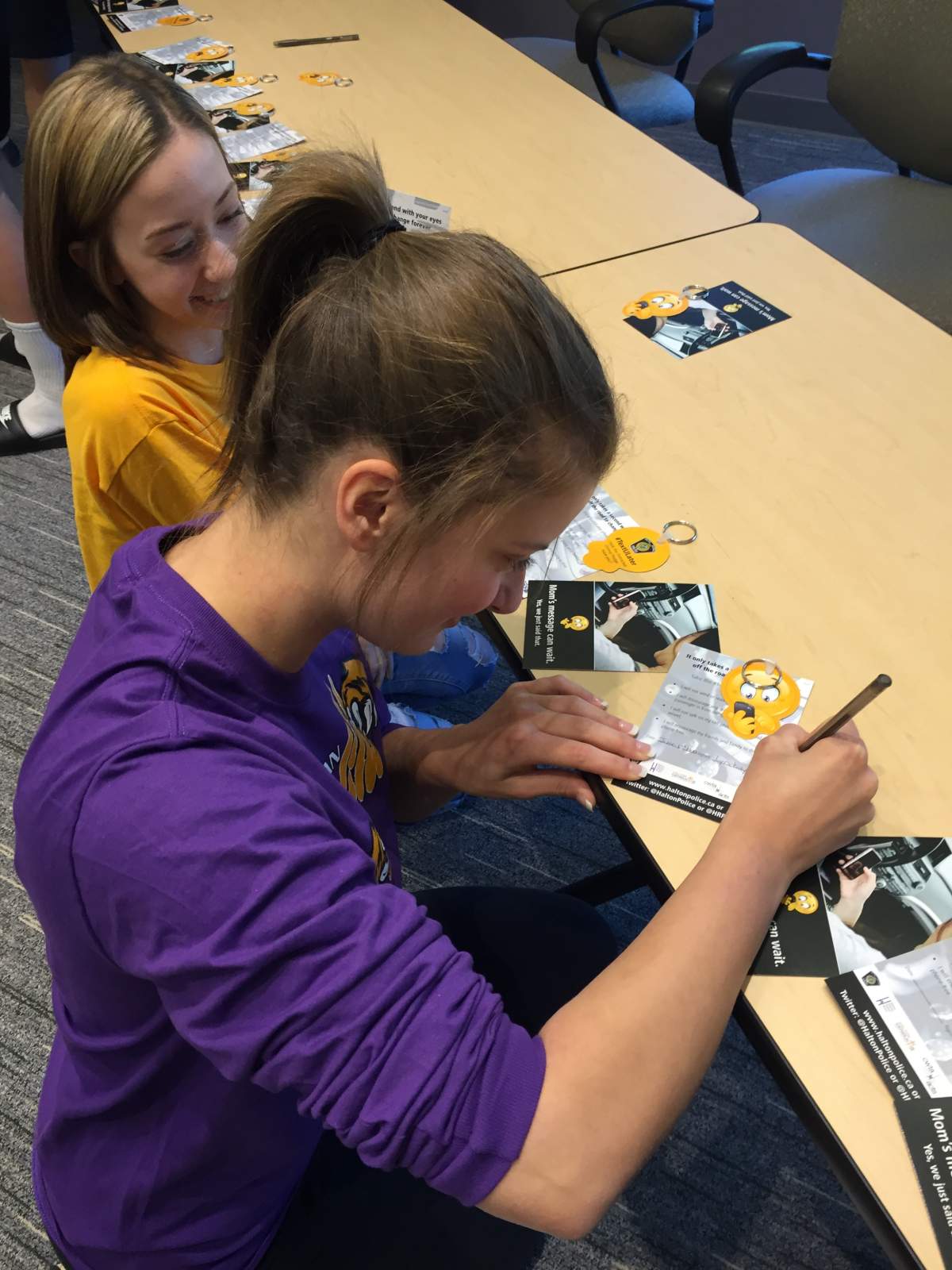 Burlington high school students take the #TextULater pledge.