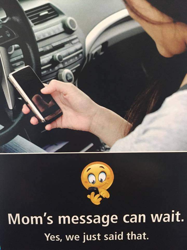 The pledge cards feature the picture of a emoji texting and reads: ‘Mom’s message can wait. Yes, we just said that.’