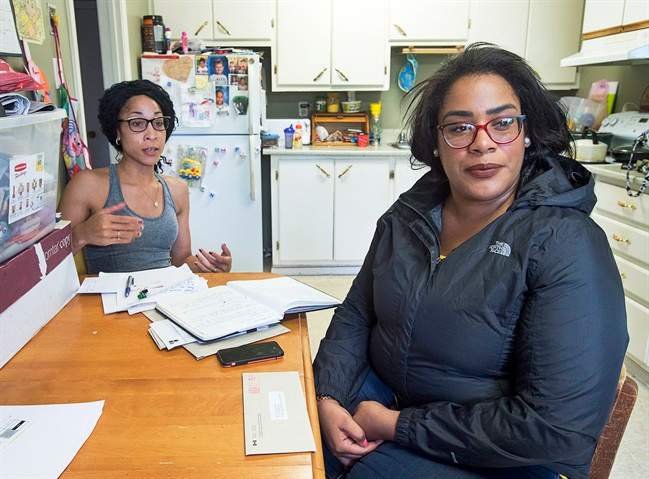 Cassandra Desmond, left, and her sister Chantel Desmond are seen in Antigonish, N.S. on Wednesday, June 14, 2017. Their brother, Lionel Desmond, a 33-year-old veteran of the war in Afghanistan who suffered from post-traumatic stress disorder, took his own life after shooting his 52-year-old mother, his wife Shanna, 31, and their 10-year-daughter Aaliyah. 