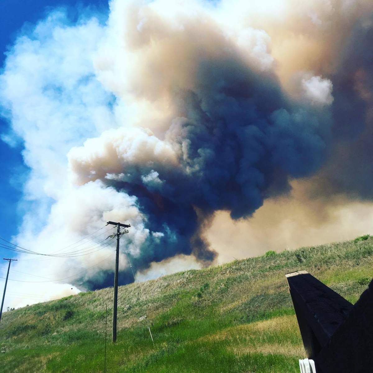 Aggressive fire is burning west of 100 Mile House.
