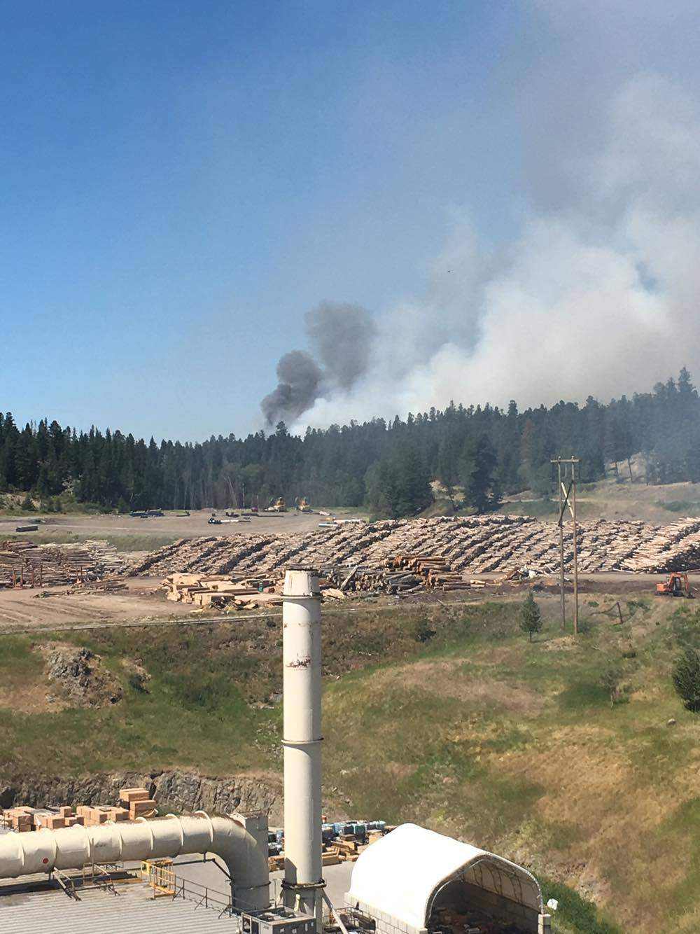 Aggressive fire is burning west of 100 Mile House.