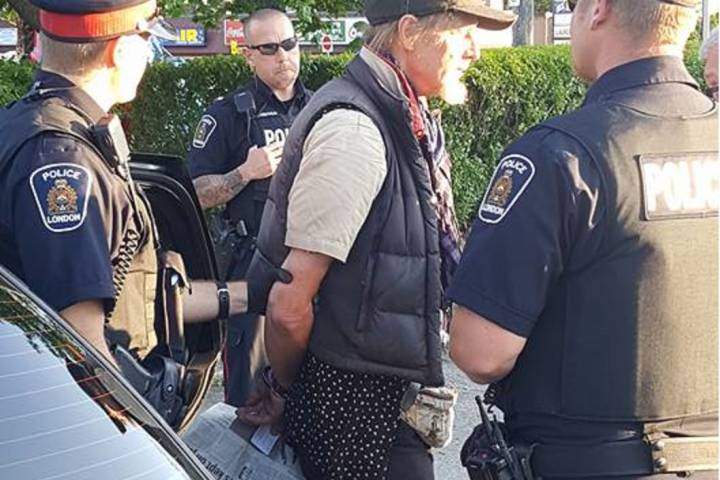 Sunny James and London Police at Huron Street and Highbury Avenue on Friday, July 14.