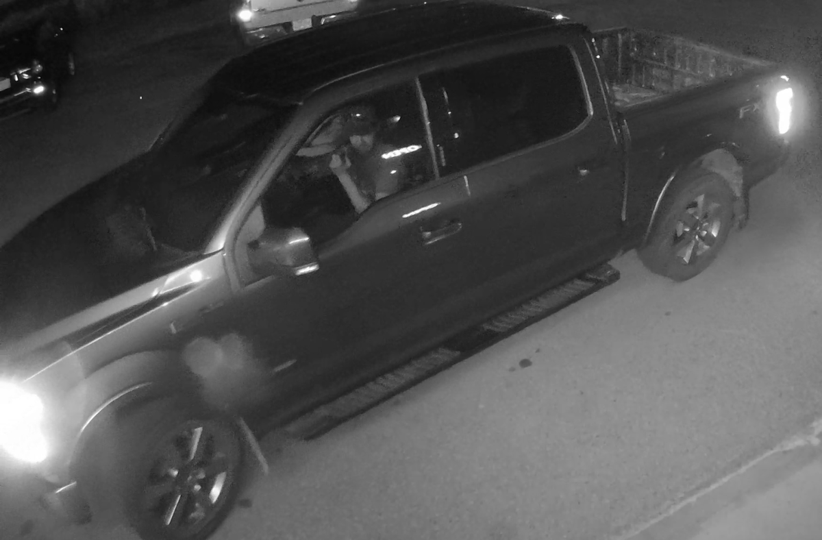 Photo from Red Deer RCMP showing a man driving a Ford truck suspected of being used in the theft on Monday, July 3, 2017.