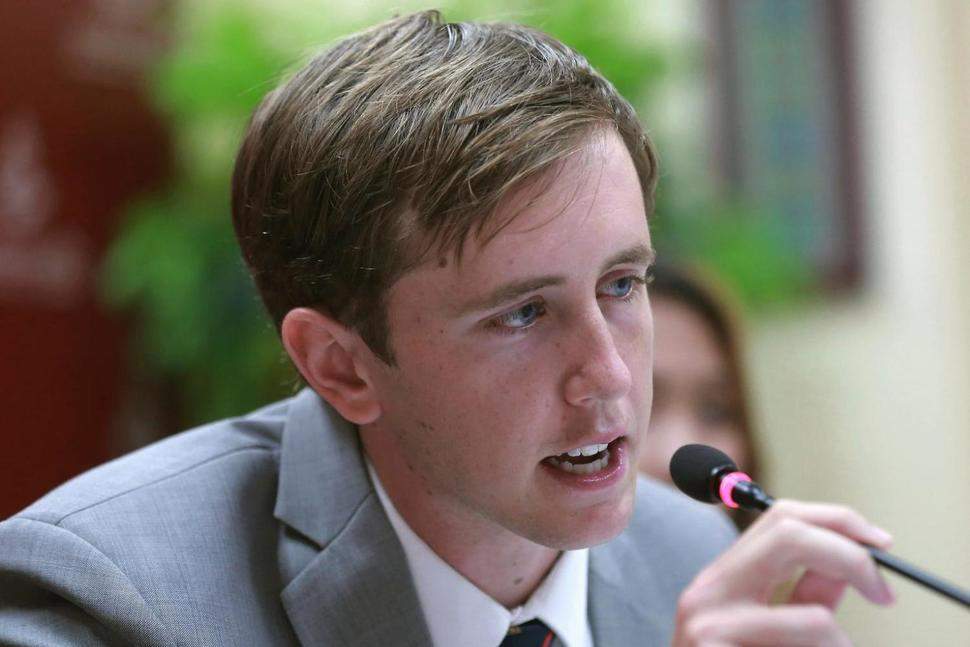 American Nathan Bartling, from Chino Hills, Calif., talks to reporters in Bangkok after he apologized for placing coins on a railroad track for a YouTube video. Bartling, who is a YouTube star with 3.29 million subscribers, is in trouble for posting a video of an age-old practice among kids: flattening coins on railroad tracks.