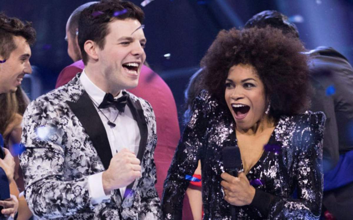 Kevin Martin, left, takes the 'Big Brother Canada' Season 5 crown beside host Arisa Cox.