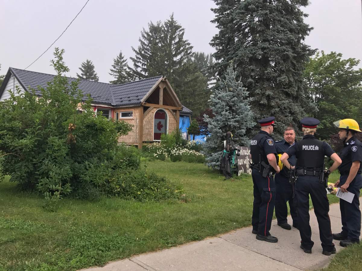 Emergency crews remain at the scene of a house fire on Boler Road in Byron on Tuesday, July 11, 2017.