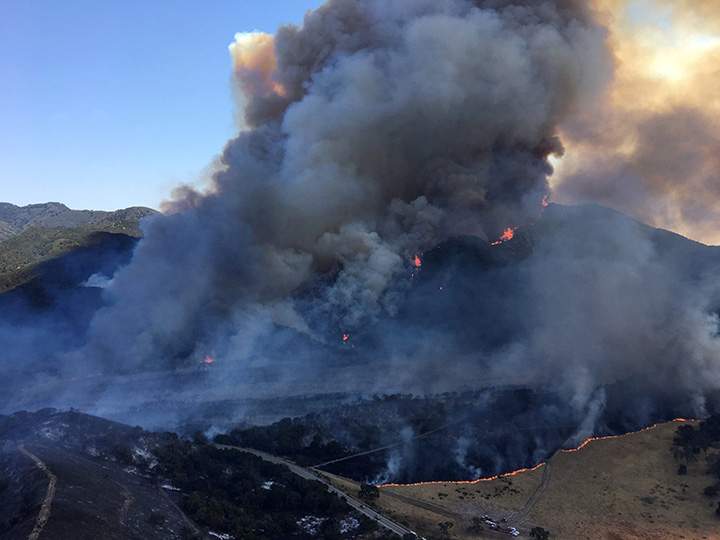 Smoke rises from the Whittier Fire near Santa Barbara, California, July 8, 2017.