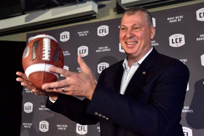 CFL Randy Ambrosie tosses a football at a press conference in Toronto, on July 5, 2017. He has previously said that the “stars seemed to have aligned” for the Halifax expansion bid, and that a 10th team in Atlantic Canada would complete the league.
