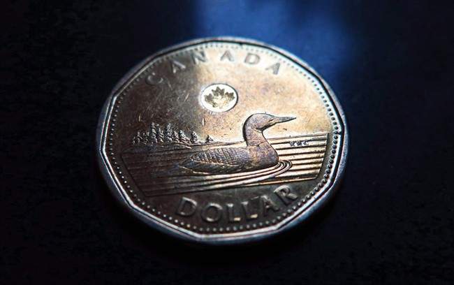 FILE - Nova Scotia's premier says he hopes the Atlantic provinces can land on a common minimum wage as early as next spring - but he maintains the goal will not be $15 an hour.