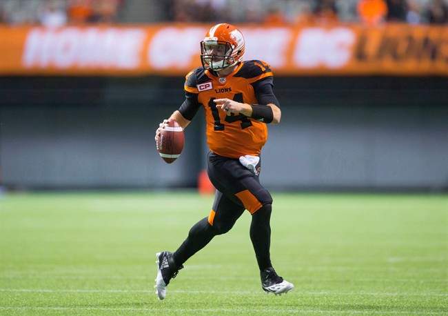 Lulay runs with the ball as he looks for an open receiver during the second half of a pre-season CFL football game against the Calgary Stampeders in Vancouver on Friday June 17, 2016.