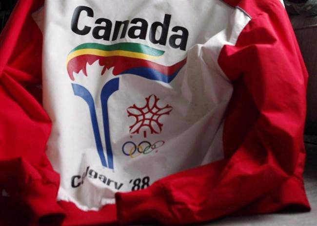 A uniform from the 1988 Olympic torch run is seen in Calgary on Thursday, Oct. 8, 2009. Calgary has extra time to mull a possible bid for the 2026 Winter Olympics and Paralympics because the International Olympic Committee has shifted its timelines. 