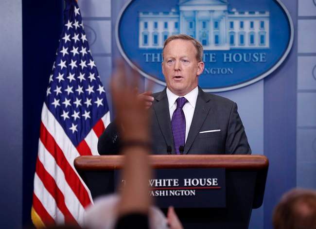 White House press secretary Sean Spicer points to members of the media as he answers questions in the Brady Briefing room of the White House in Washington, Monday, July 17, 2017. 